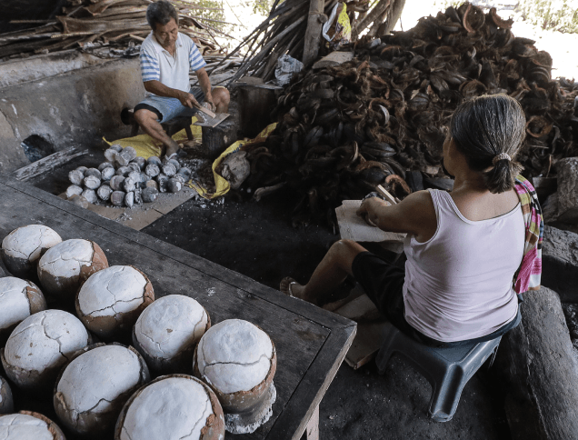 A Photo of a group of Boholanos making the traditional artisinal sea salt