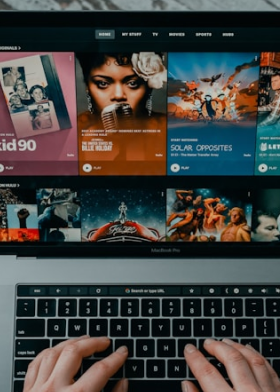 A laptop screen with movie website