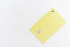 A yellow card with top chip.